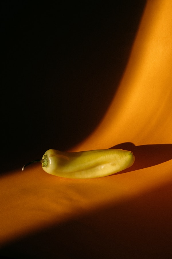 Yellow banana fruit on orange textile