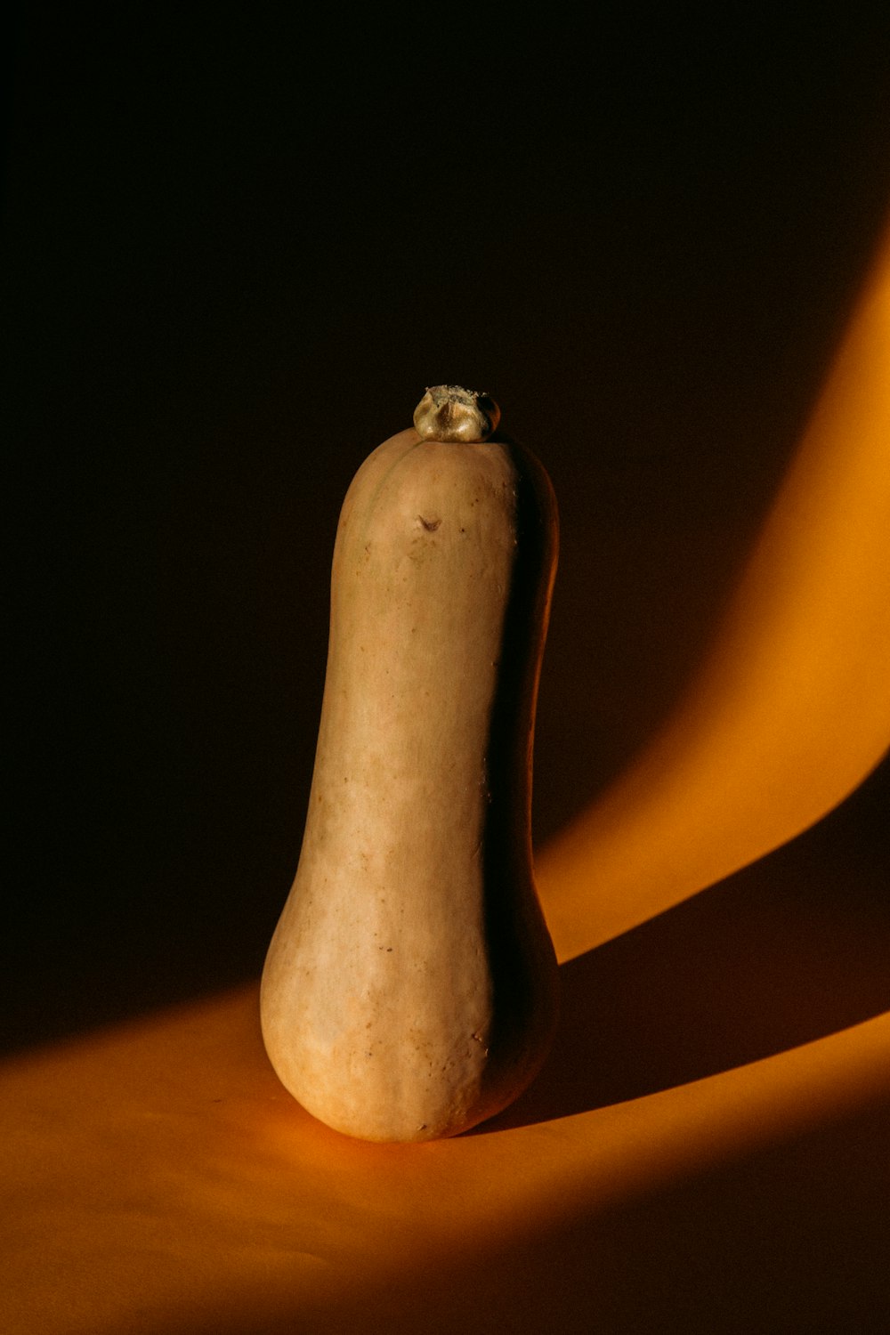 yellow and brown fruit on brown wooden table