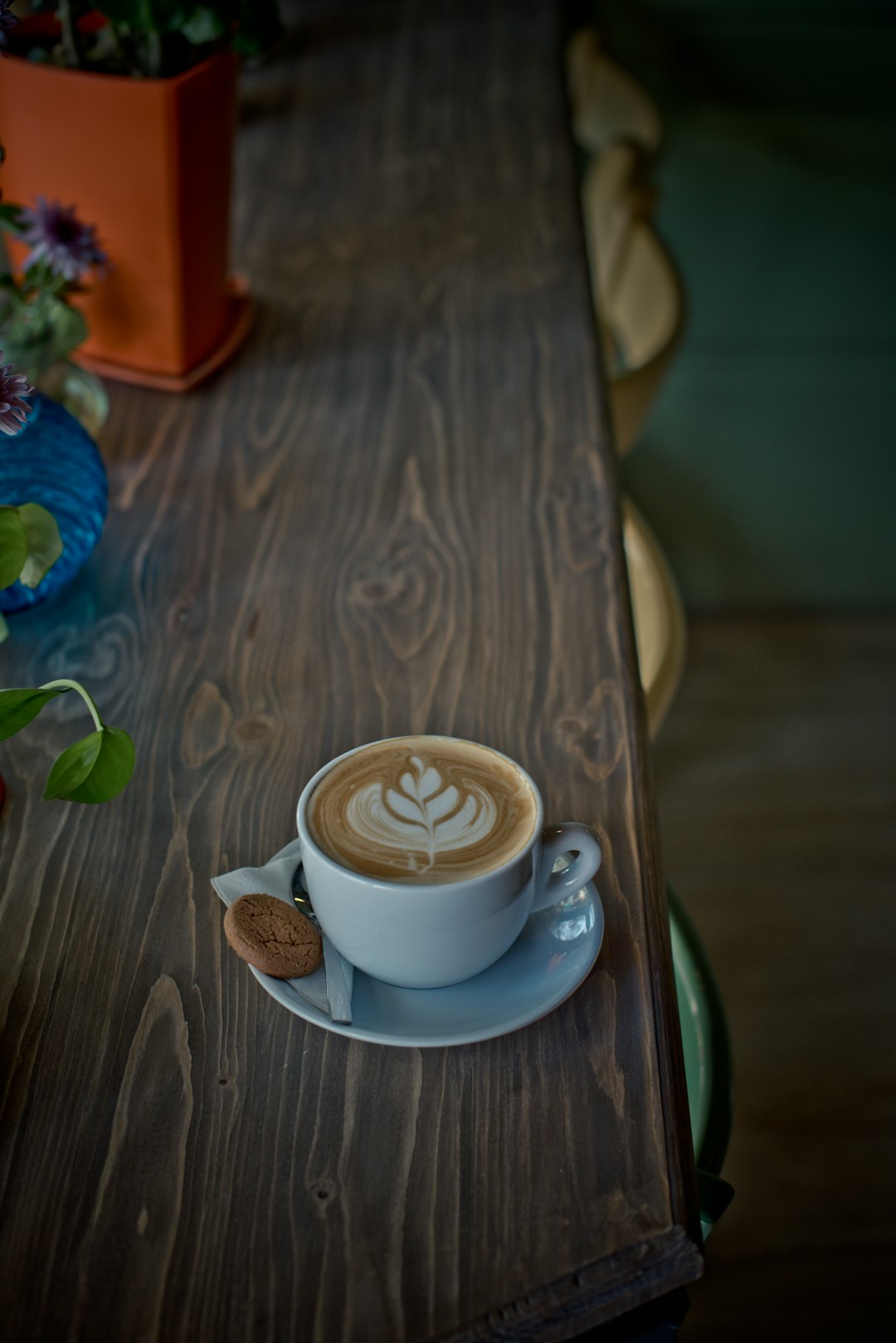 white ceramic cup on white ceramic saucer