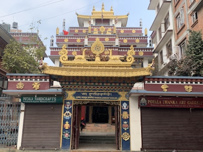 Welcoming entrance of Birla Dharamshala with vibrant colors and signage.