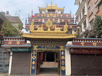 Welcoming entrance of Neeladri Bhakta Niwas with colorful local artwork
