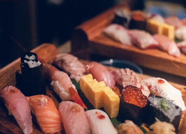 sushi on brown wooden tray