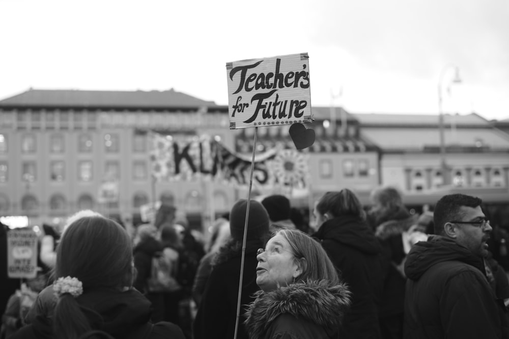 grayscale photo of people walking on street