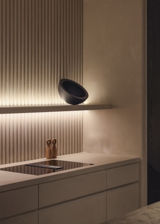 white ceramic sink beside window