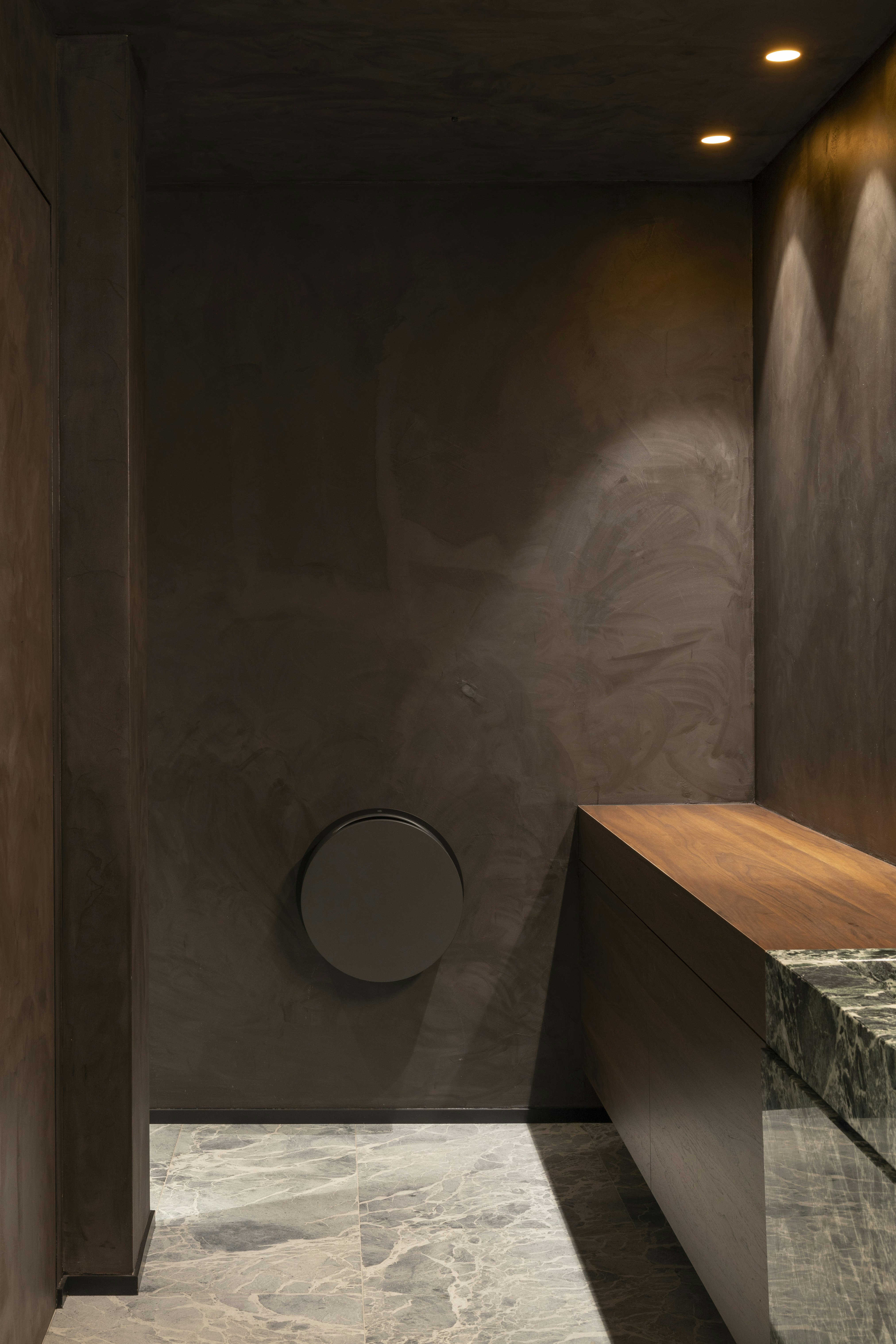 In-wall toilet enhances modern bathroom aesthetic