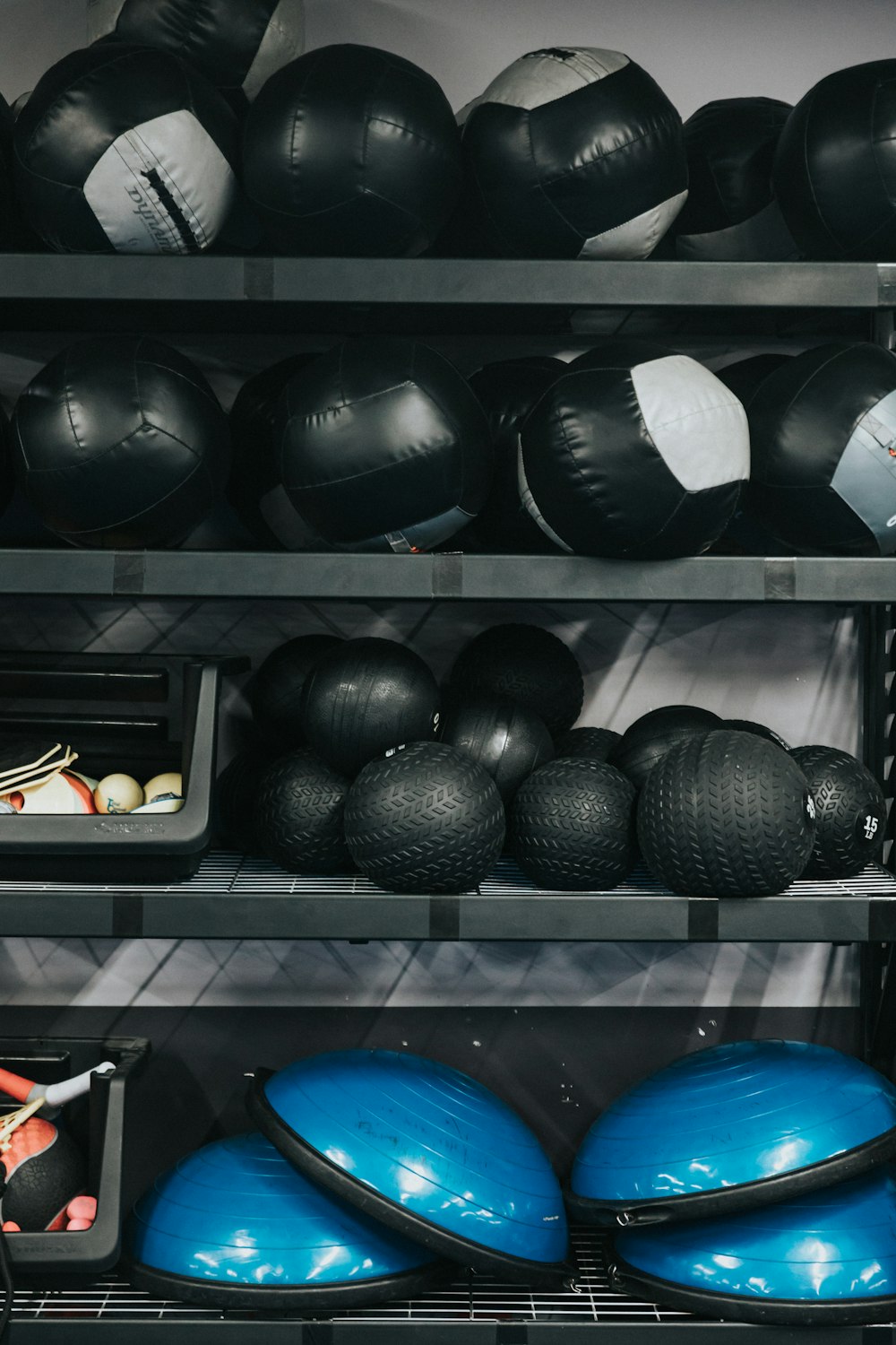 black round ball on black plastic rack