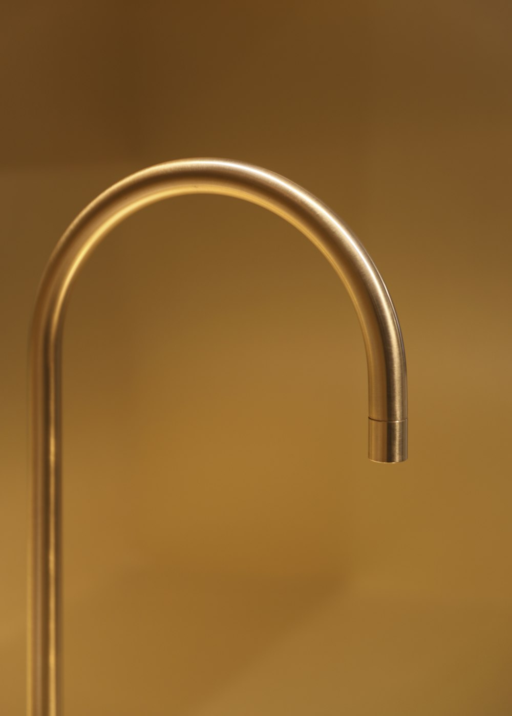 stainless steel faucet in close up photography