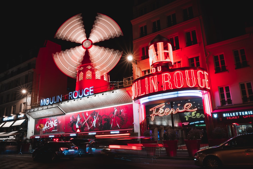 red and white ferris wheel during night time