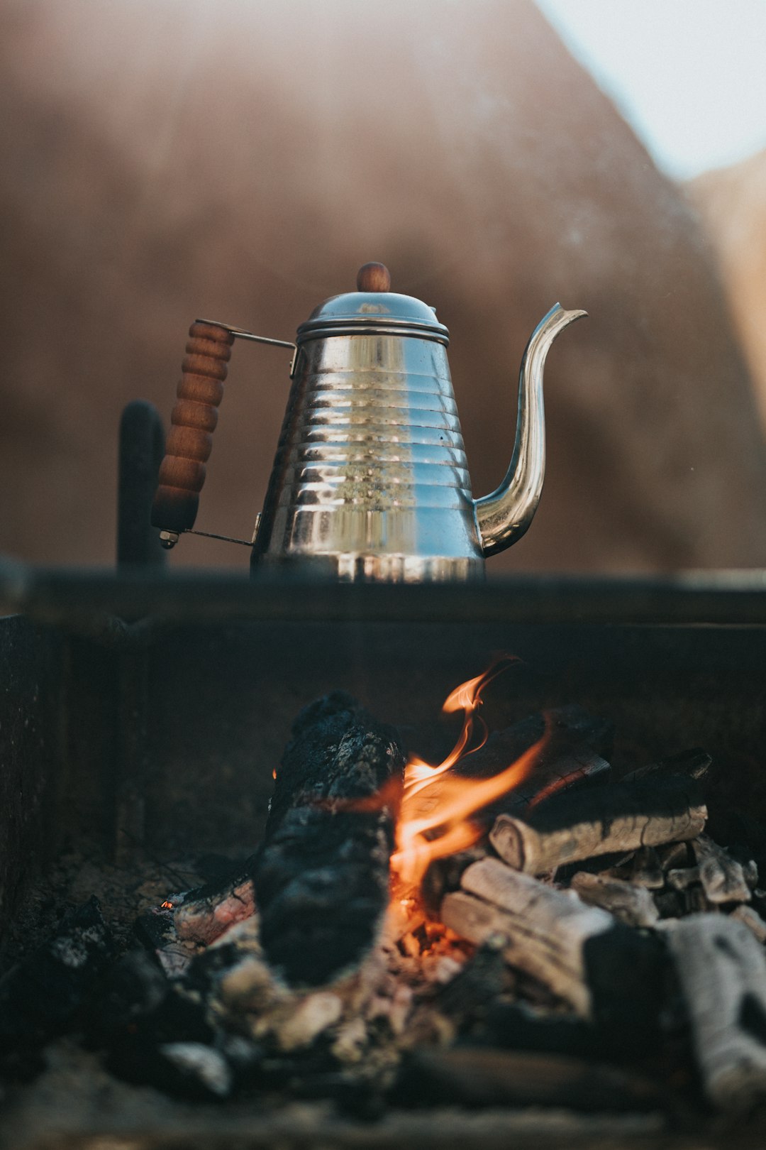 stainless steel kettle on fire