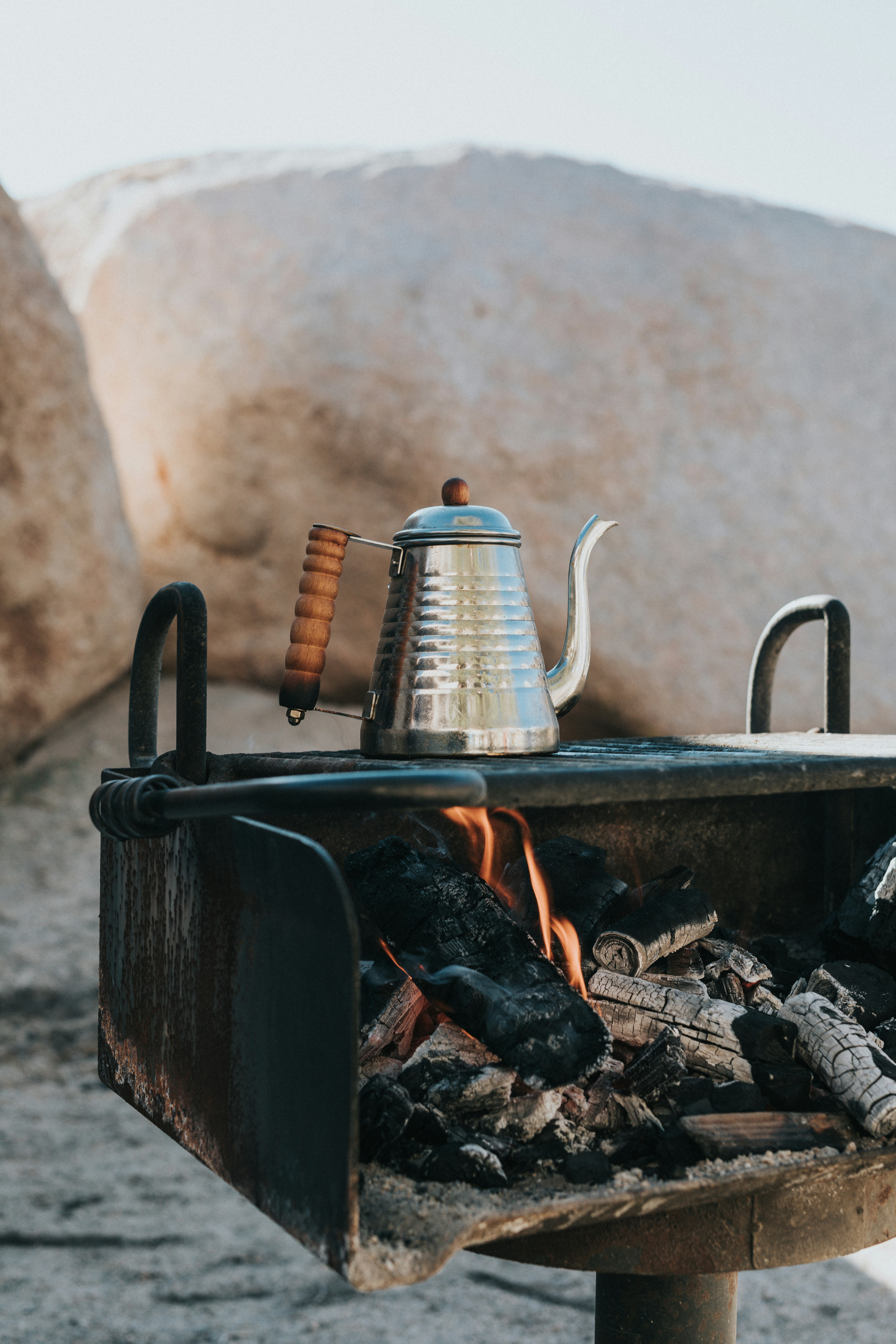 Black Kettle On Fire Pit Photo Free Fire Image On Unsplash