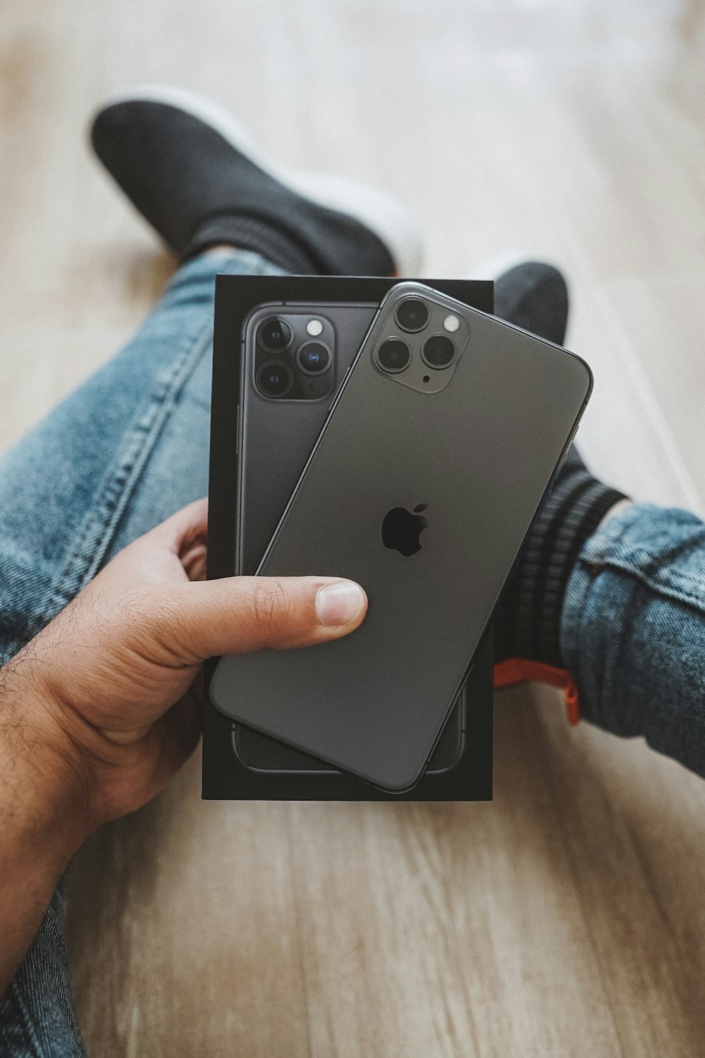 person holding black iphone 7 plus