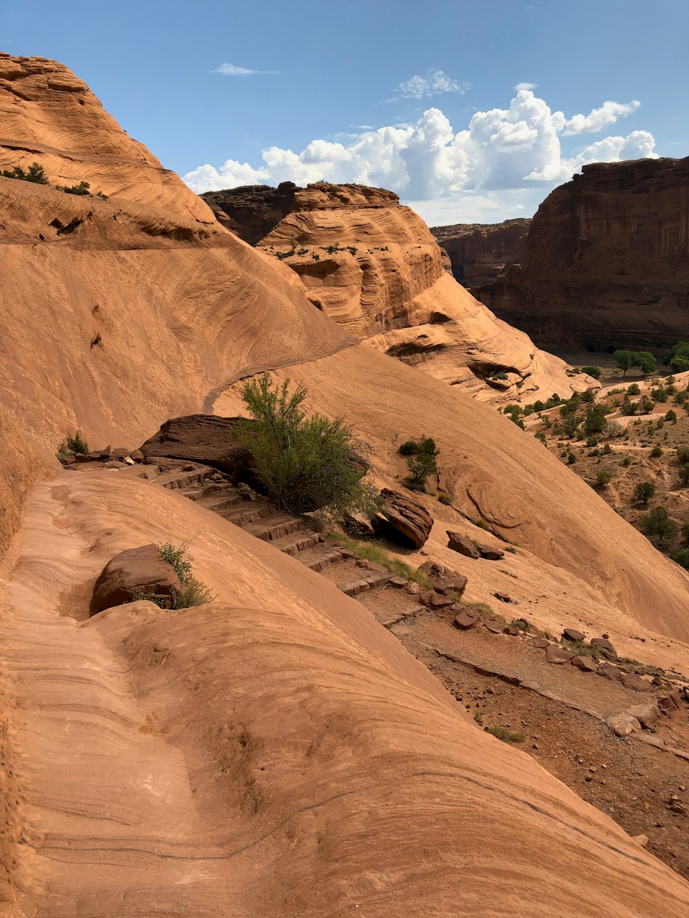 brown rock formation under blue sky during daytime