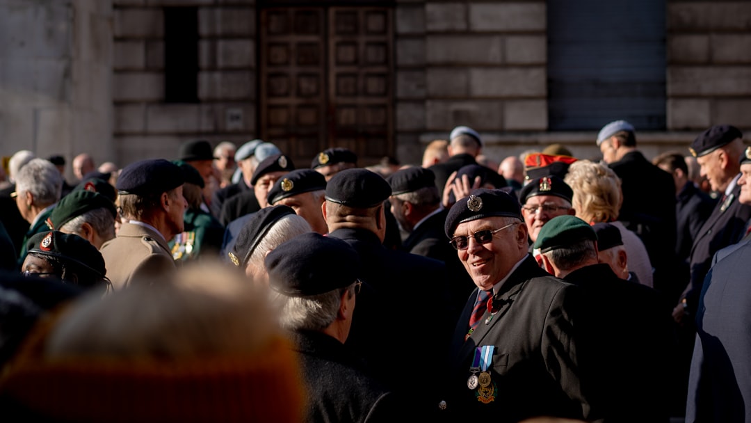 man in black coat and black hat