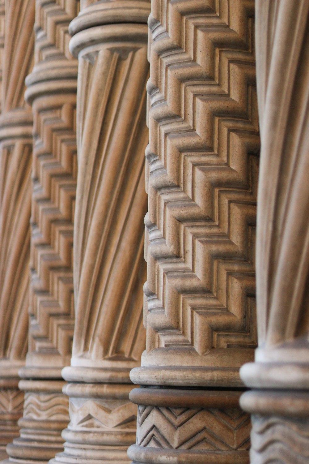 brown and white concrete pillars