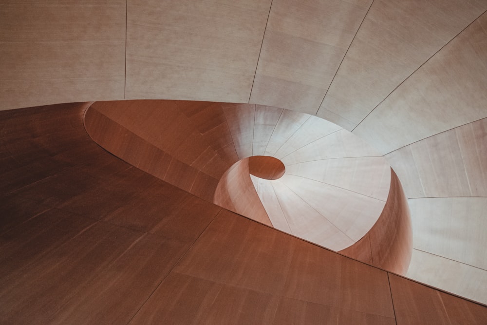 brown wooden round table on brown wooden floor