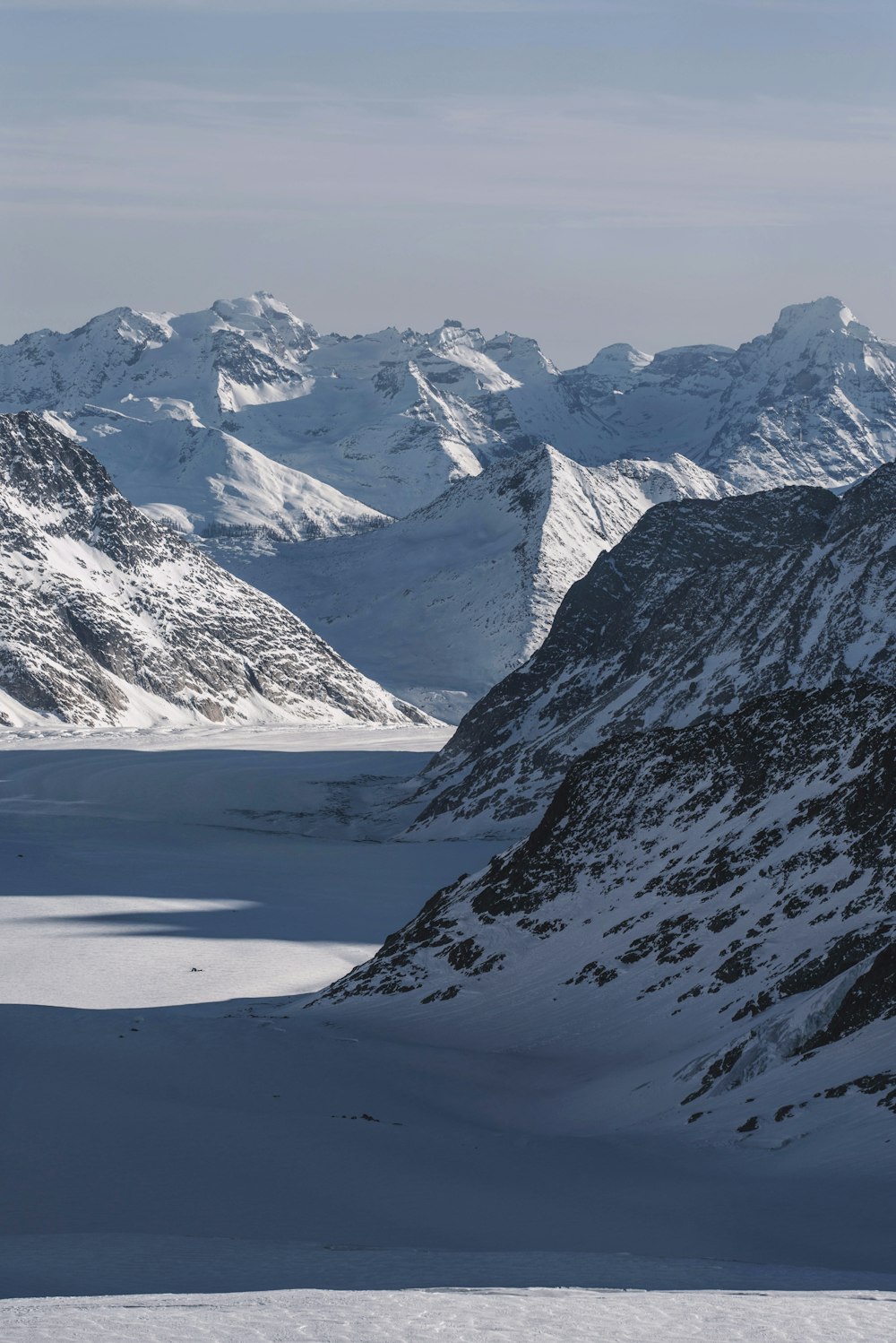 snow covered mountain during daytime