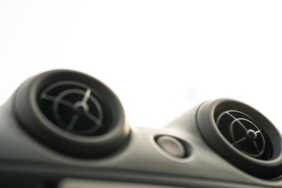 Close-up of clean air vents with sunlight highlighting the fresh interior.