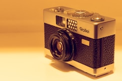 black and silver nikon camera