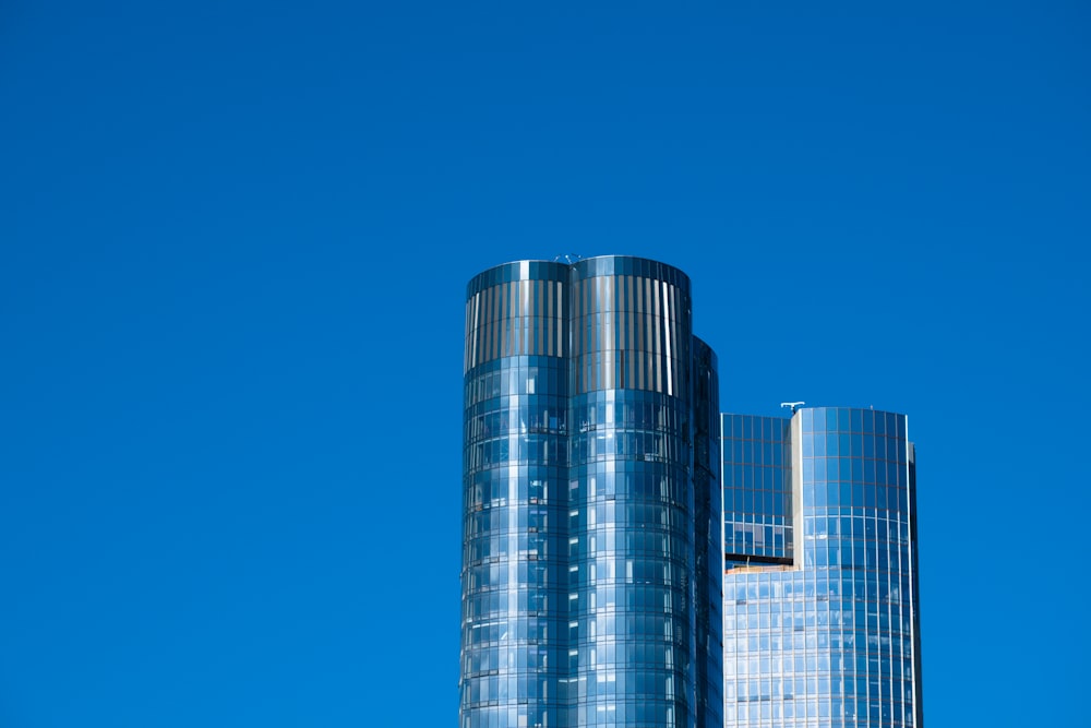 gray and black high rise building under blue sky during daytime