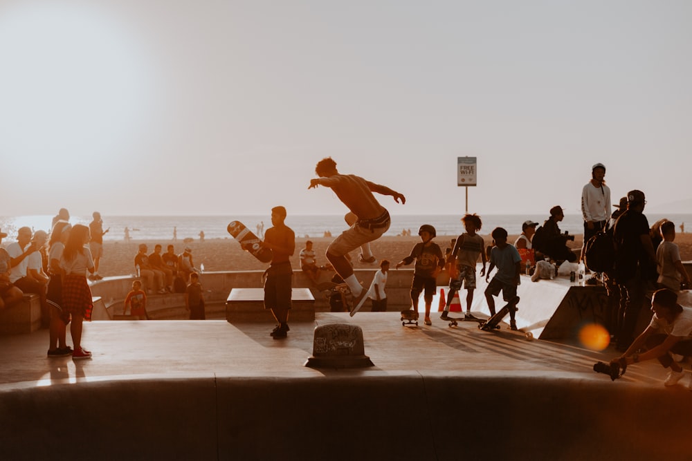 people standing on brown wooden dock during daytime