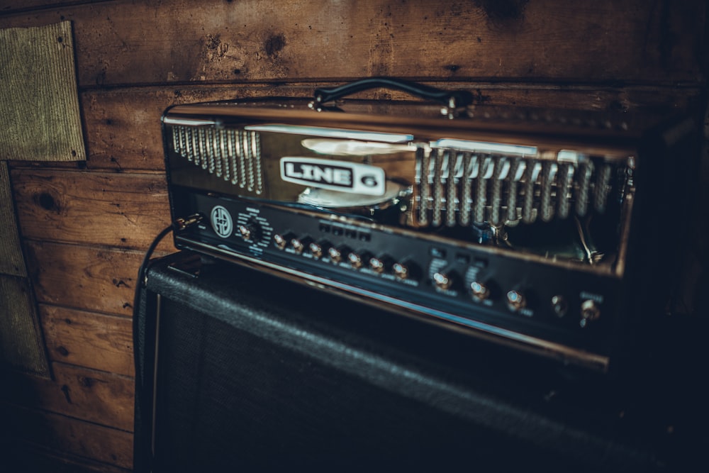 black and silver guitar amplifier