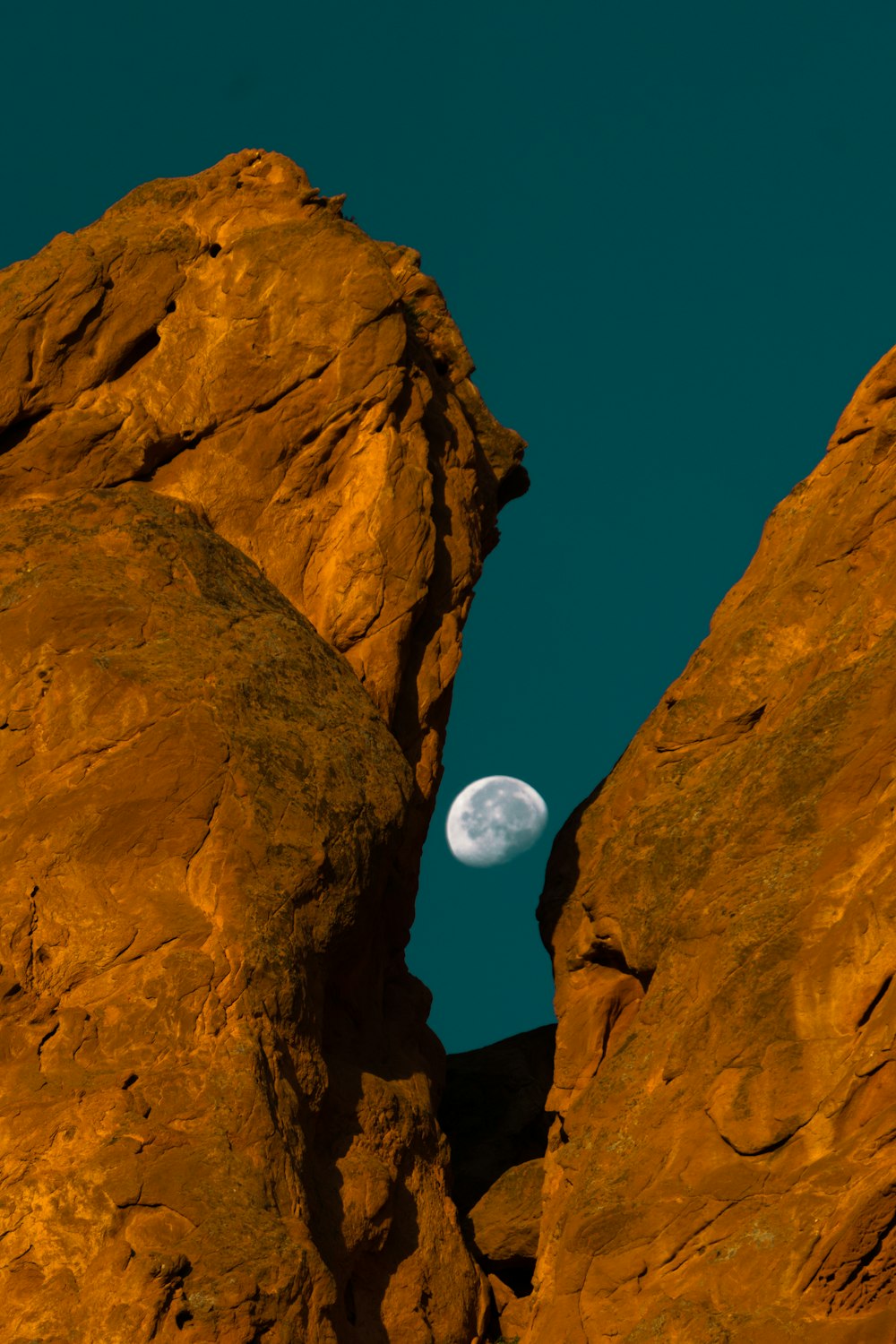 brown rock formation under blue sky during daytime