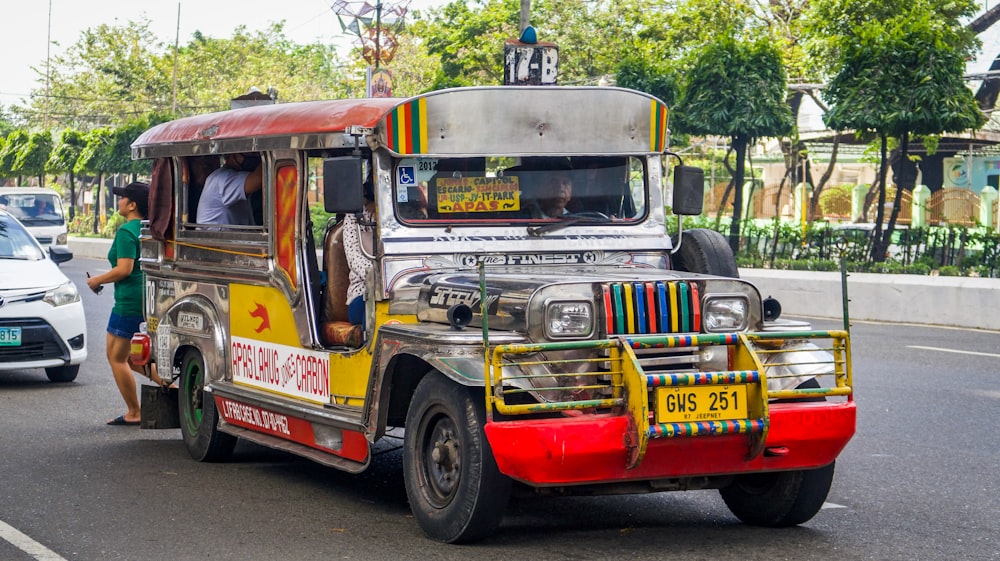 white and red truck on road during daytime