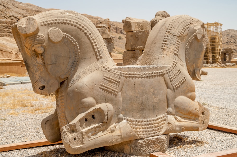 brown concrete elephant statue during daytime