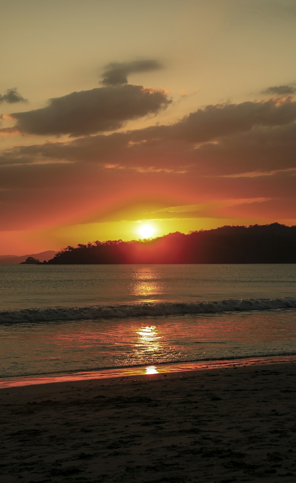 body of water during sunset