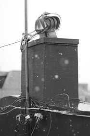 An image showcasing a technician performing maintenance on a heating system.