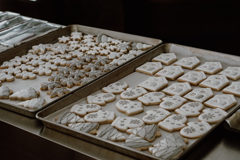 white and brown pastries on stainless steel tray