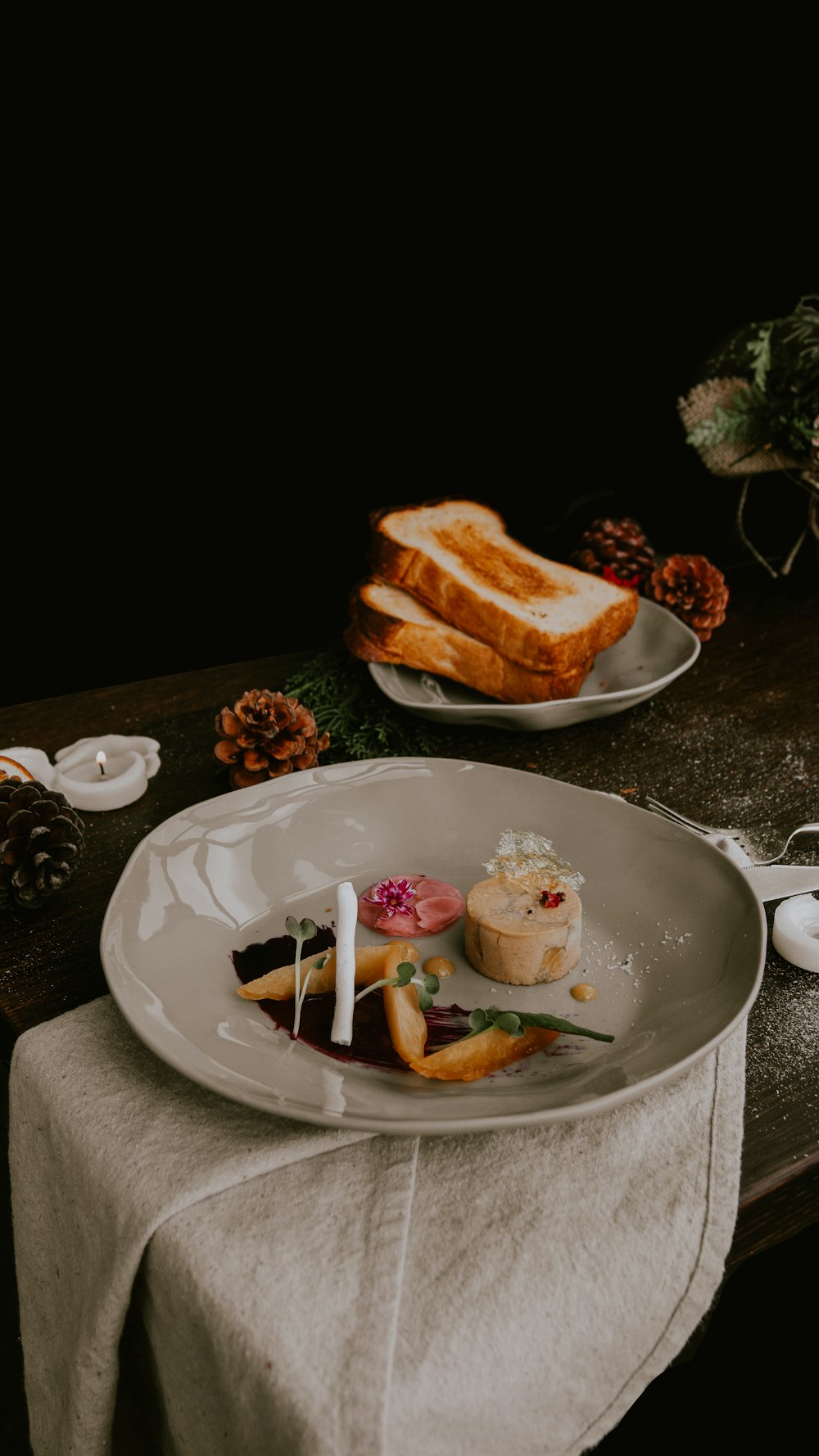 bread with cream on white ceramic plate