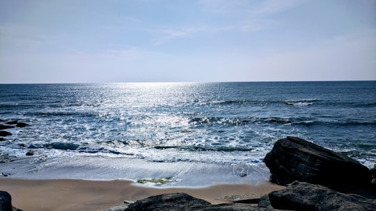 sea waves crashing on shore during daytime in Yala National Park Sri Lanka