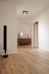 black tower speaker beside white wall