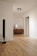 black tower speaker beside white wall