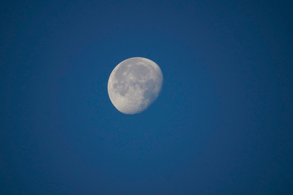 full moon in blue sky