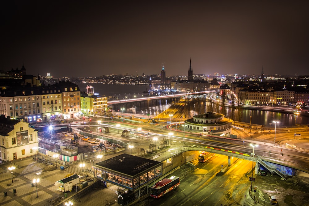 city with high rise buildings during night time