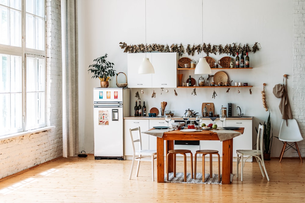 brown wooden table with chairs