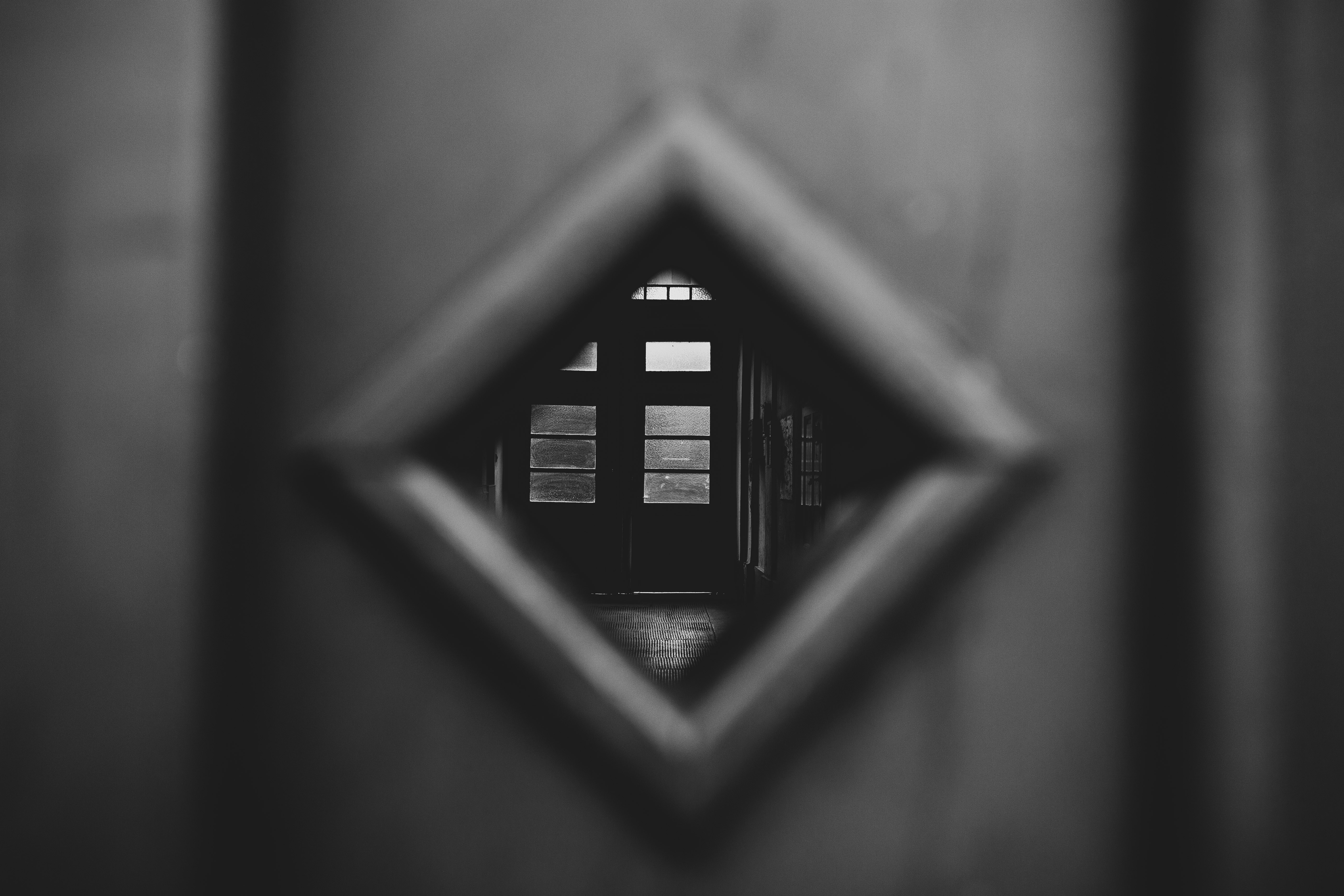 black and white photo of a window