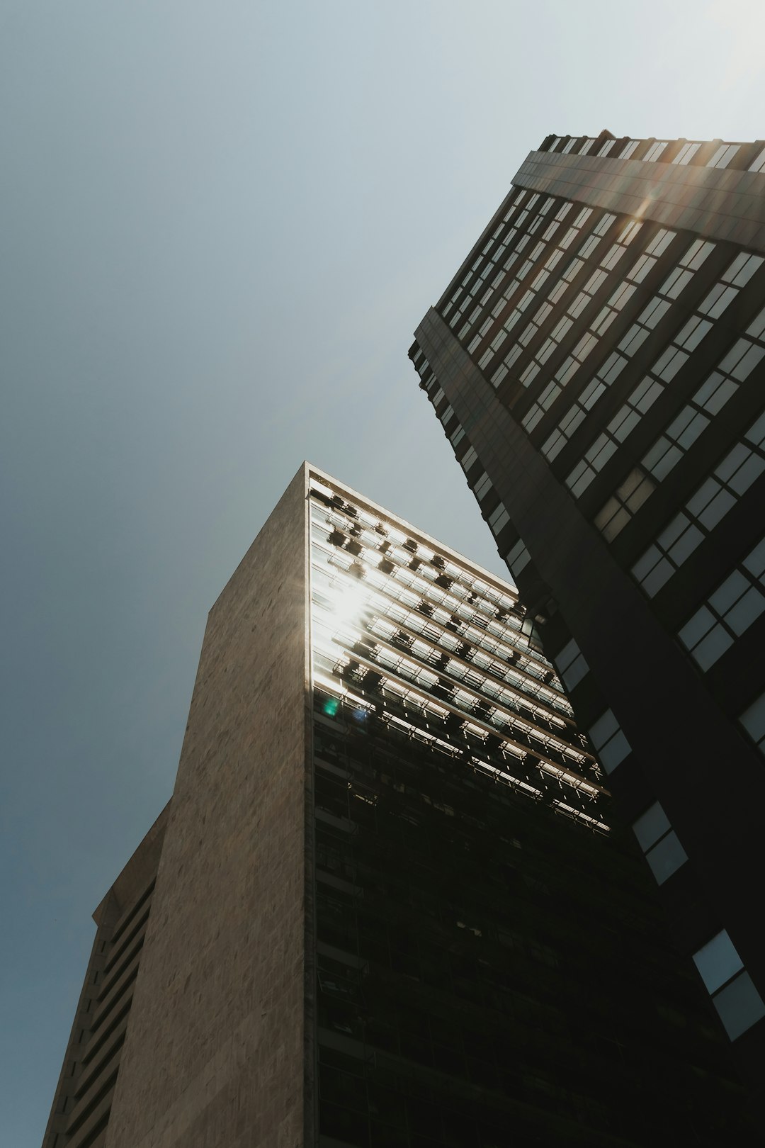 brown concrete building under blue sky during daytime