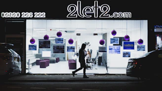 A welcoming office space with a bright window overlooking San Diego homes.