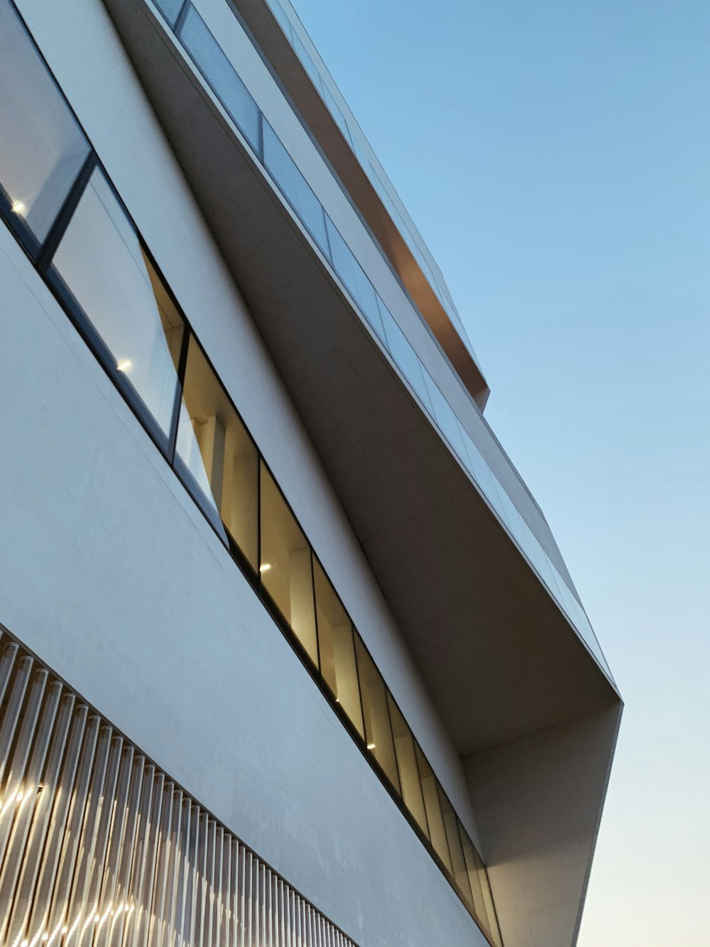 white concrete building under blue sky during daytime