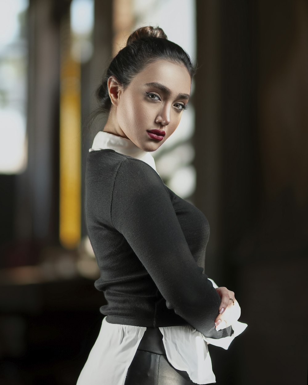 woman in black blazer and white dress shirt