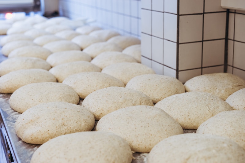 Sourdough baking in warm summer kitchen with cooling dough