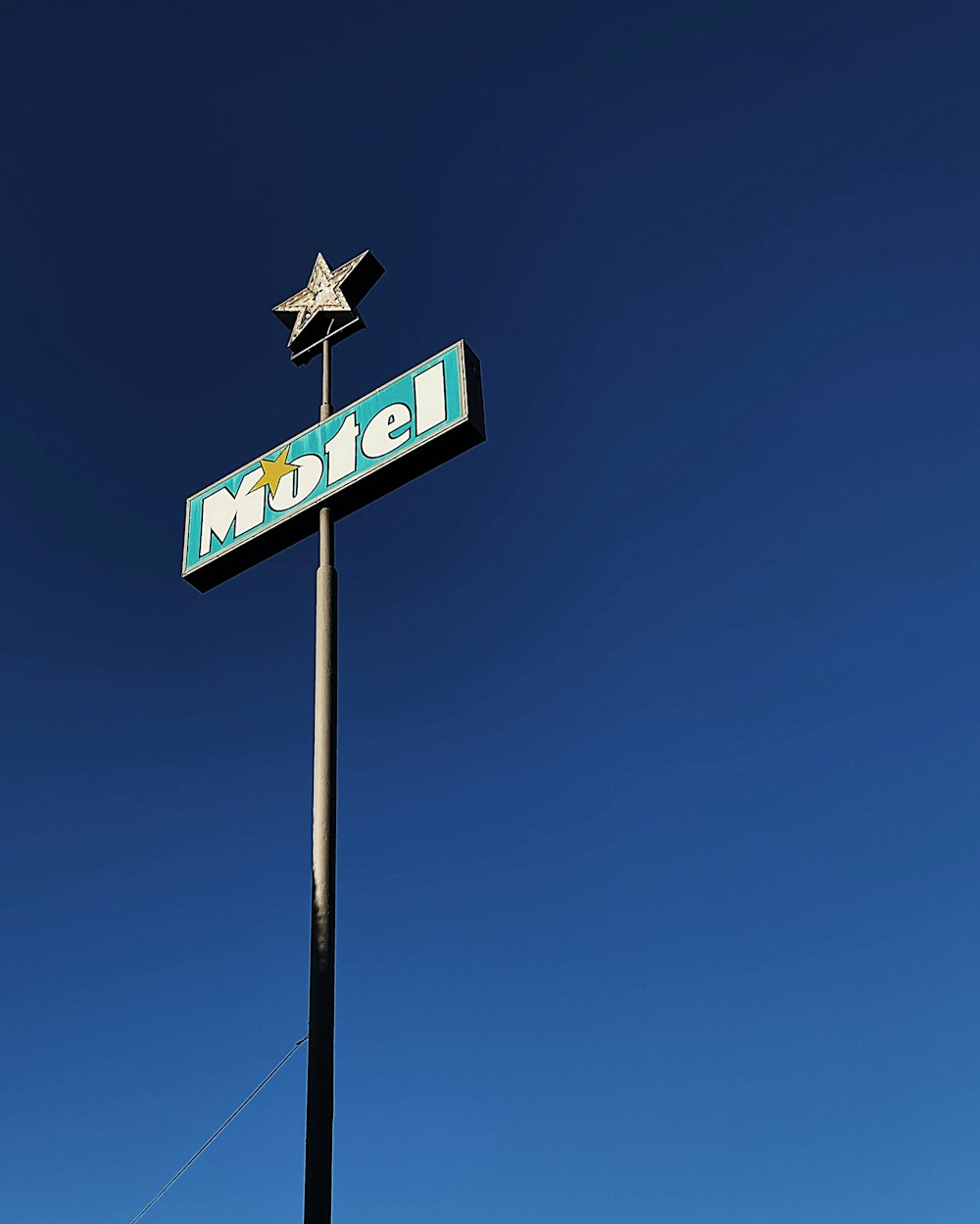 blue and white street sign