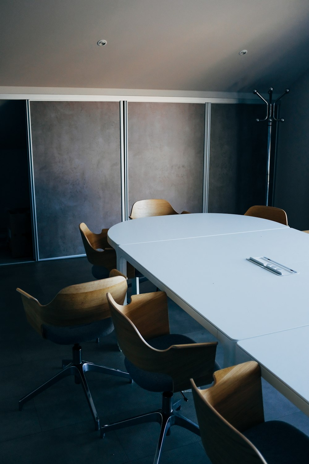 white wooden table with chairs