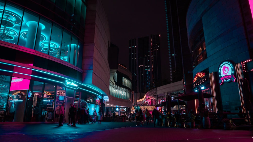 people walking on street during night time