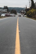 a long yellow line on the side of a road