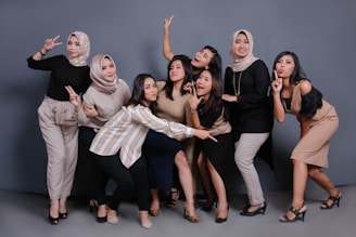 3 women and 2 men posing for photo