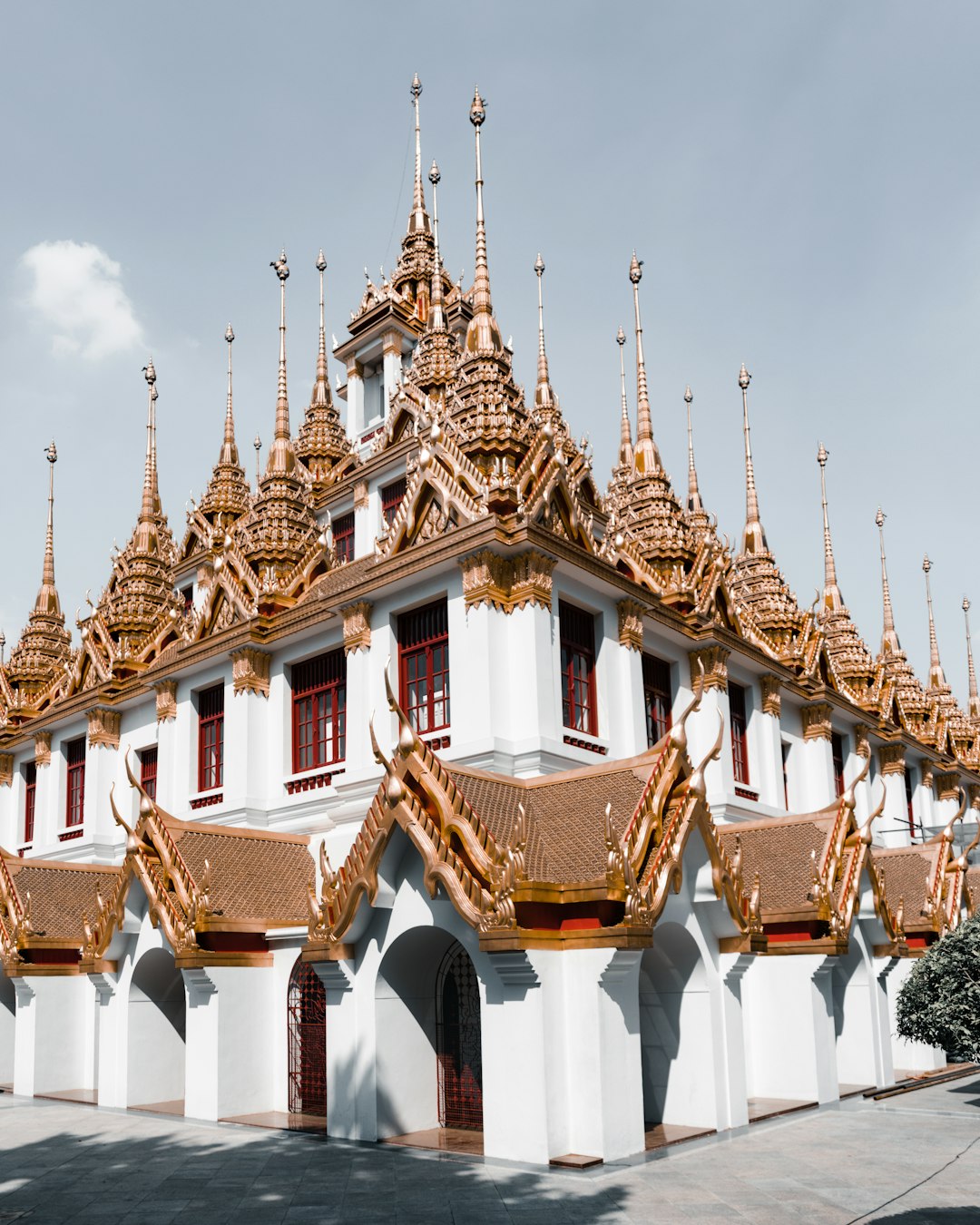 brown and white temple under white sky during daytime